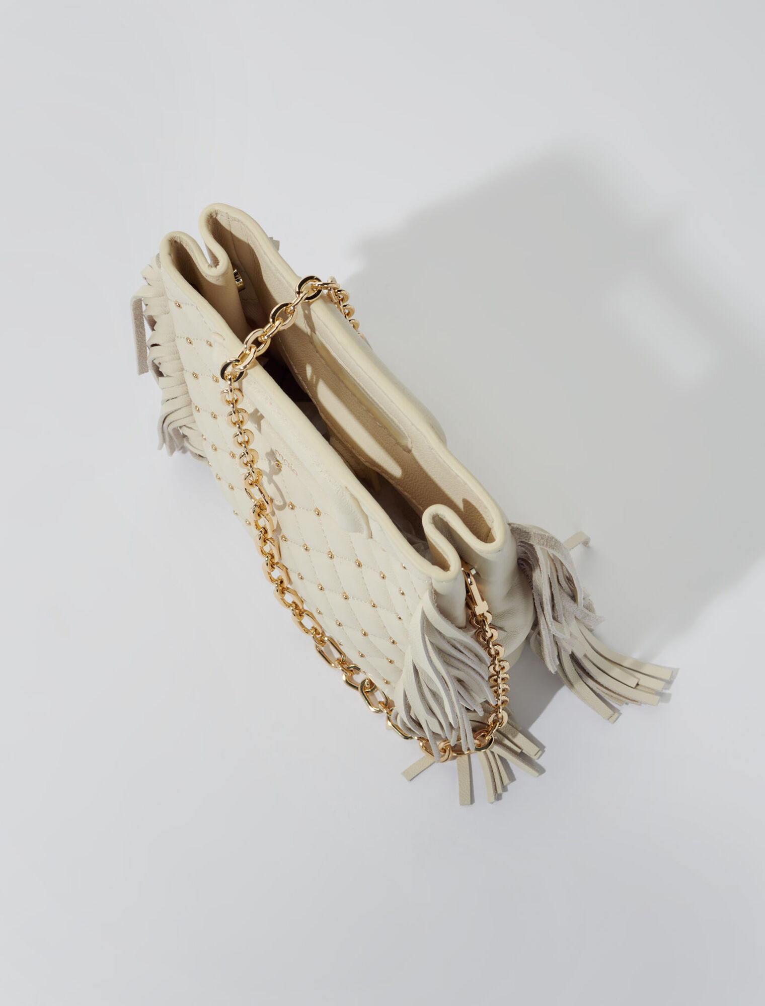 Sac M mini en cuir matelassé à studs