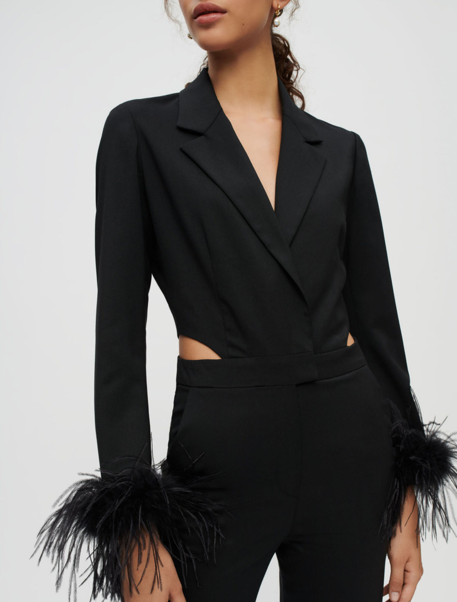 Combinaison pantalon noire à plumes