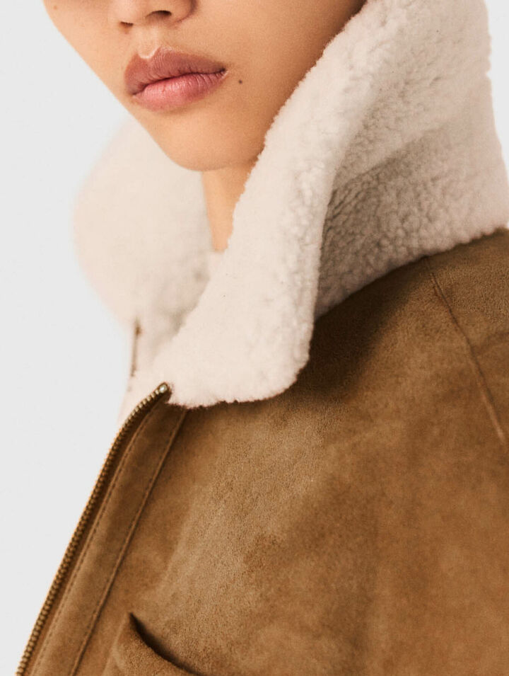 Manteau en peau lain&eacute;e r&eacute;versible
