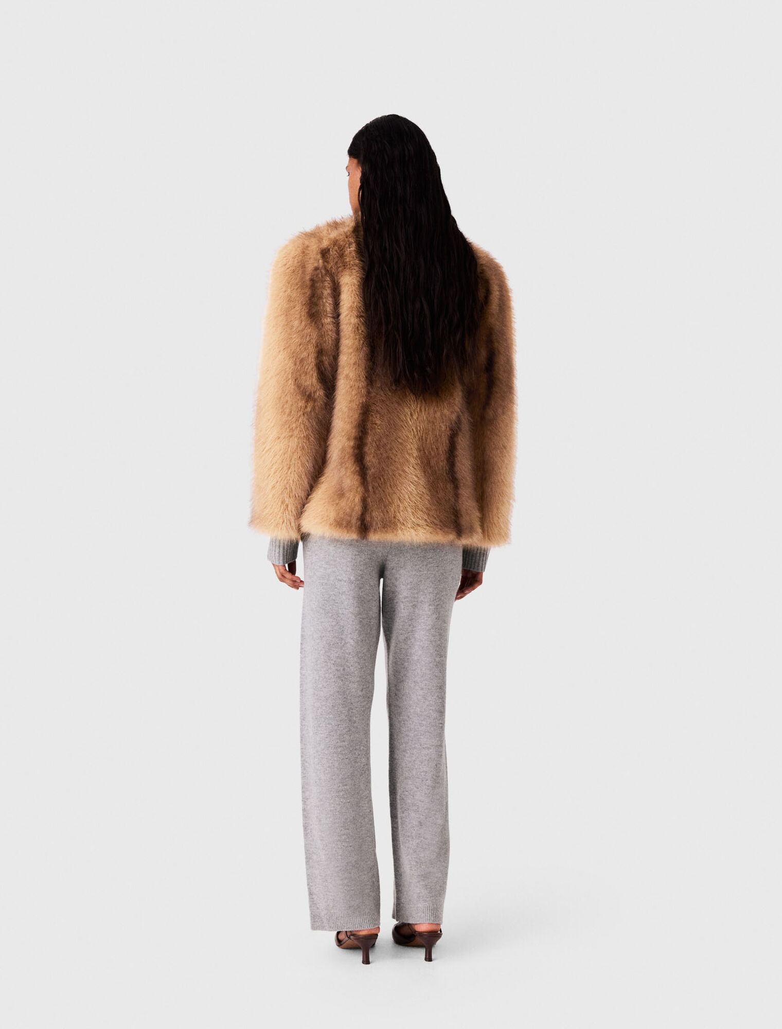 Manteau mi-long en fausse fourrure