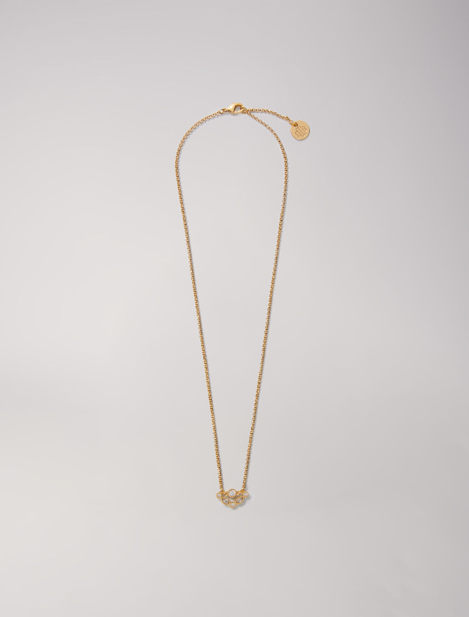 Collier doré orné de strass