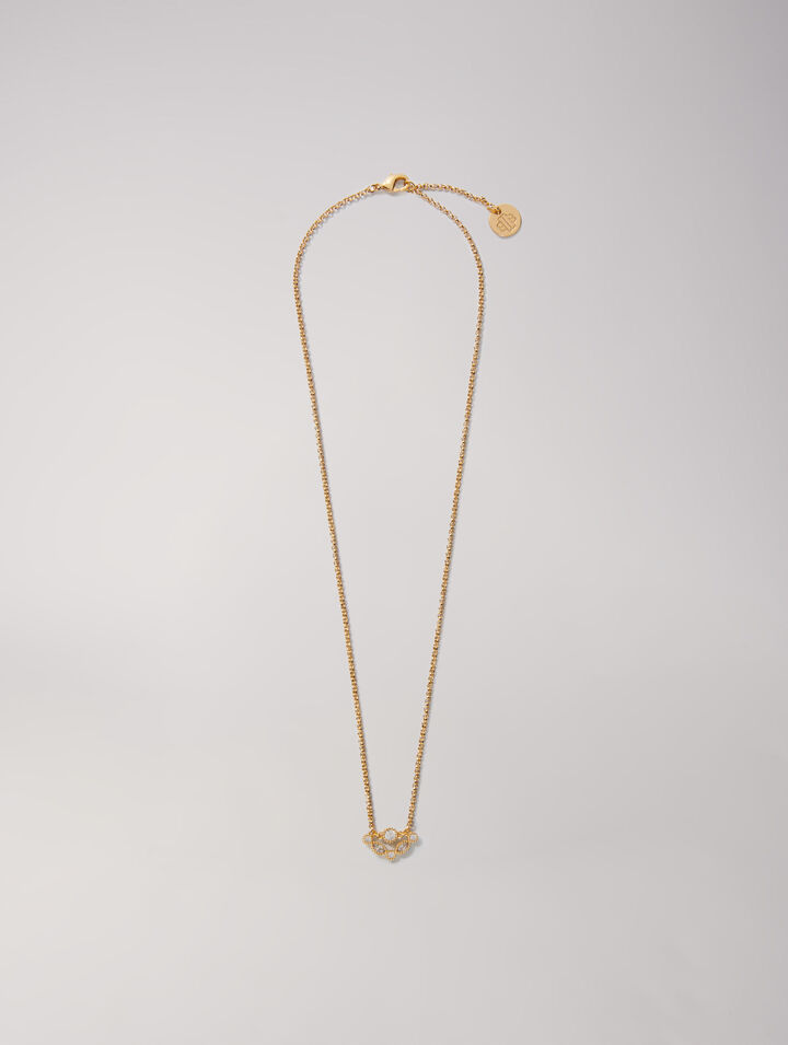 Collier doré orné de strass