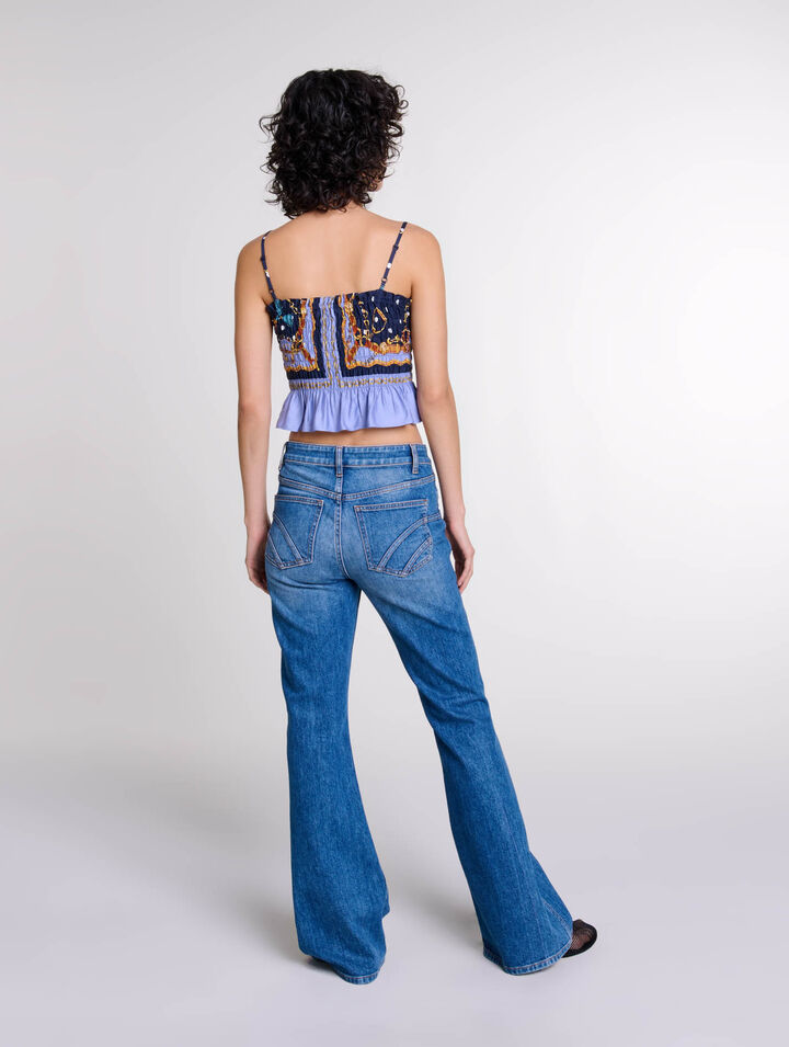 Jean flare à poches brodées