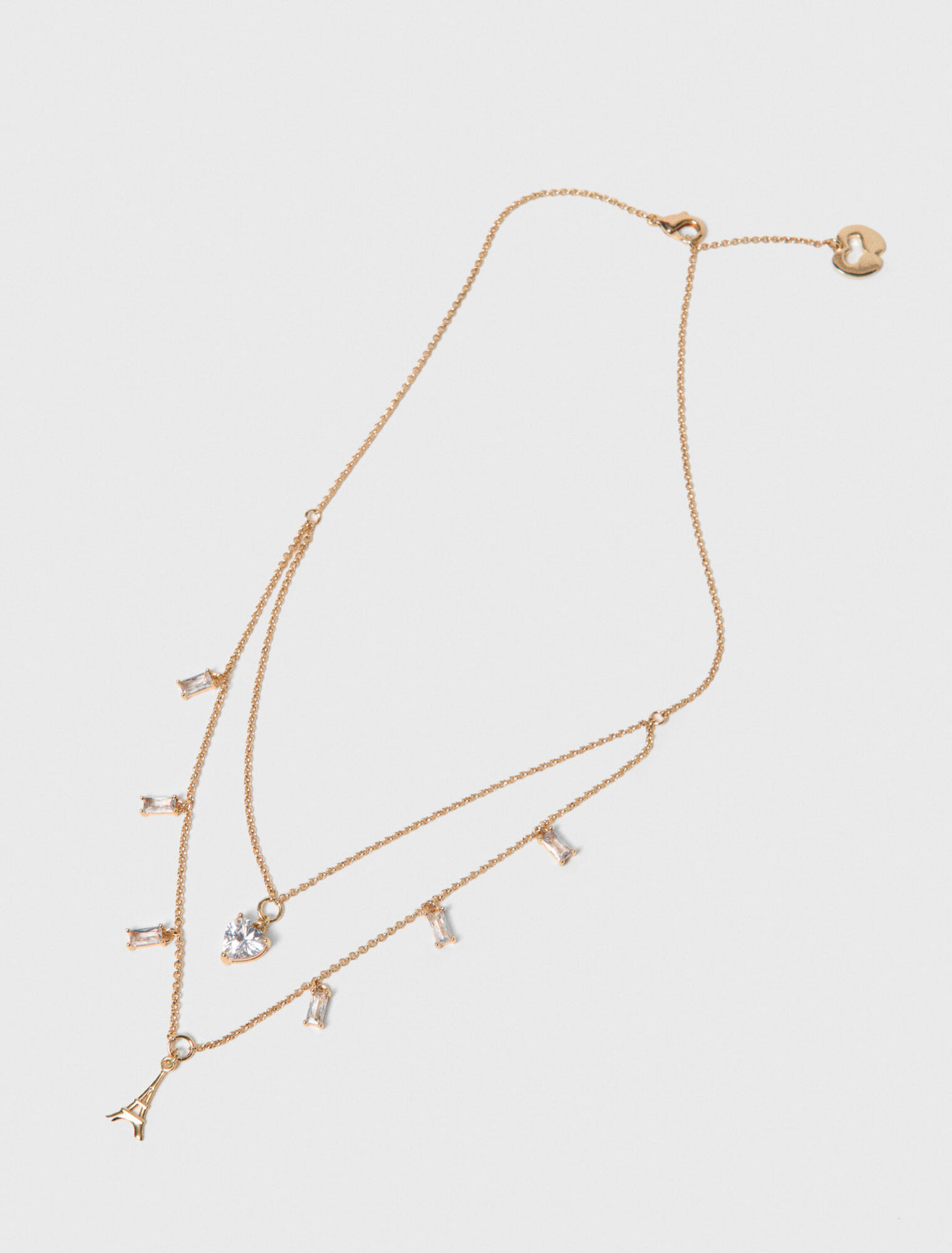 Collier double &agrave; charms strass&eacute;s