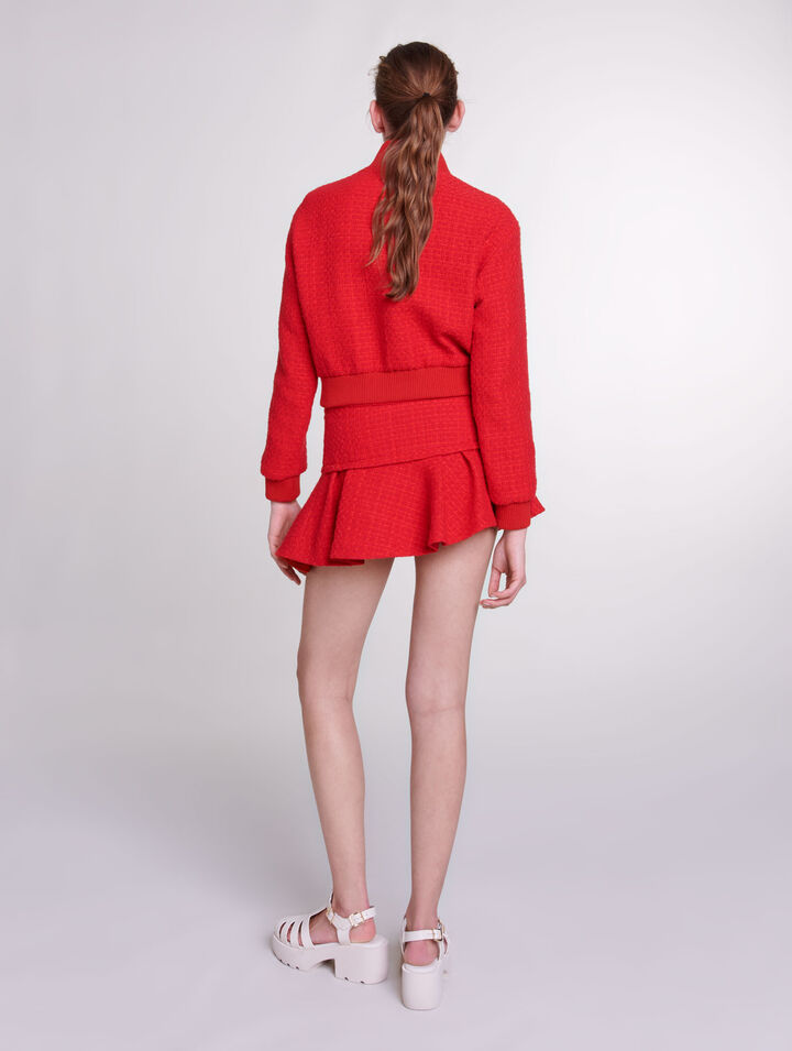 Mini-jupe en tweed asymétrique