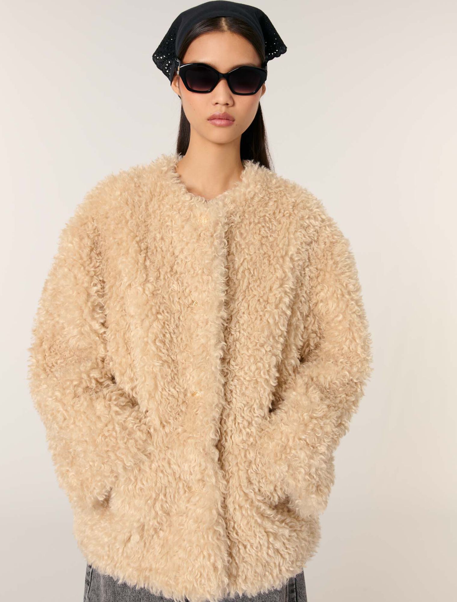 Manteau court en fausse fourrure