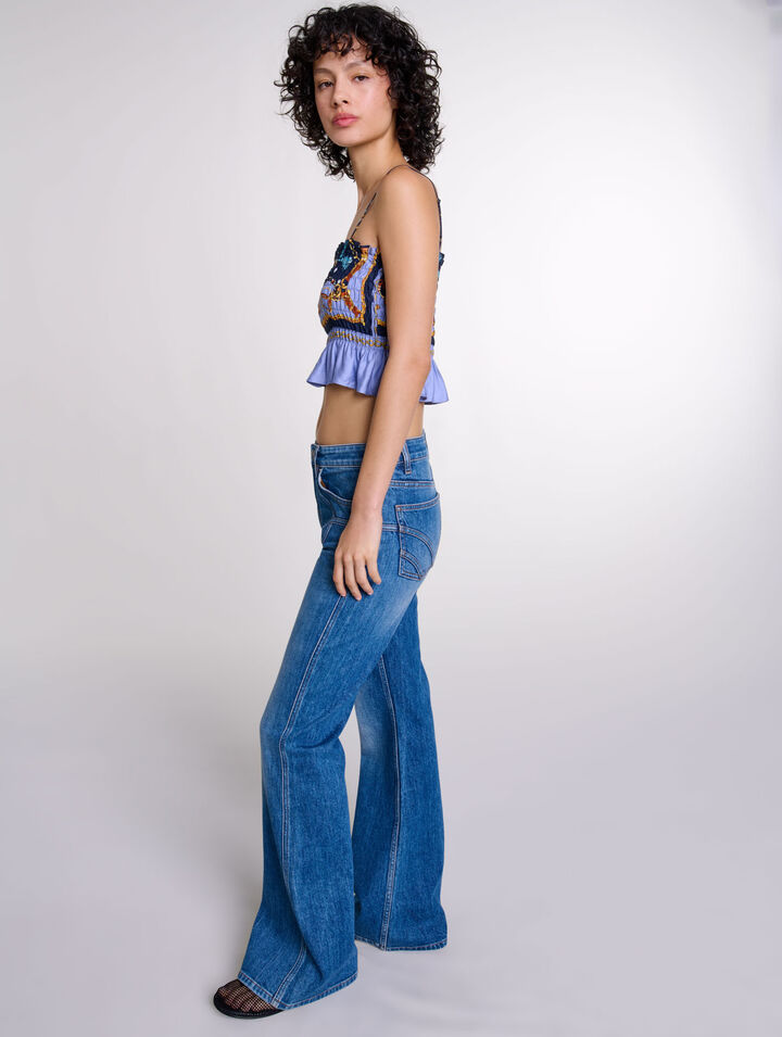 Jean flare à poches brodées