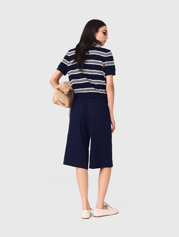 Polo ray&eacute; avec strass sur le col