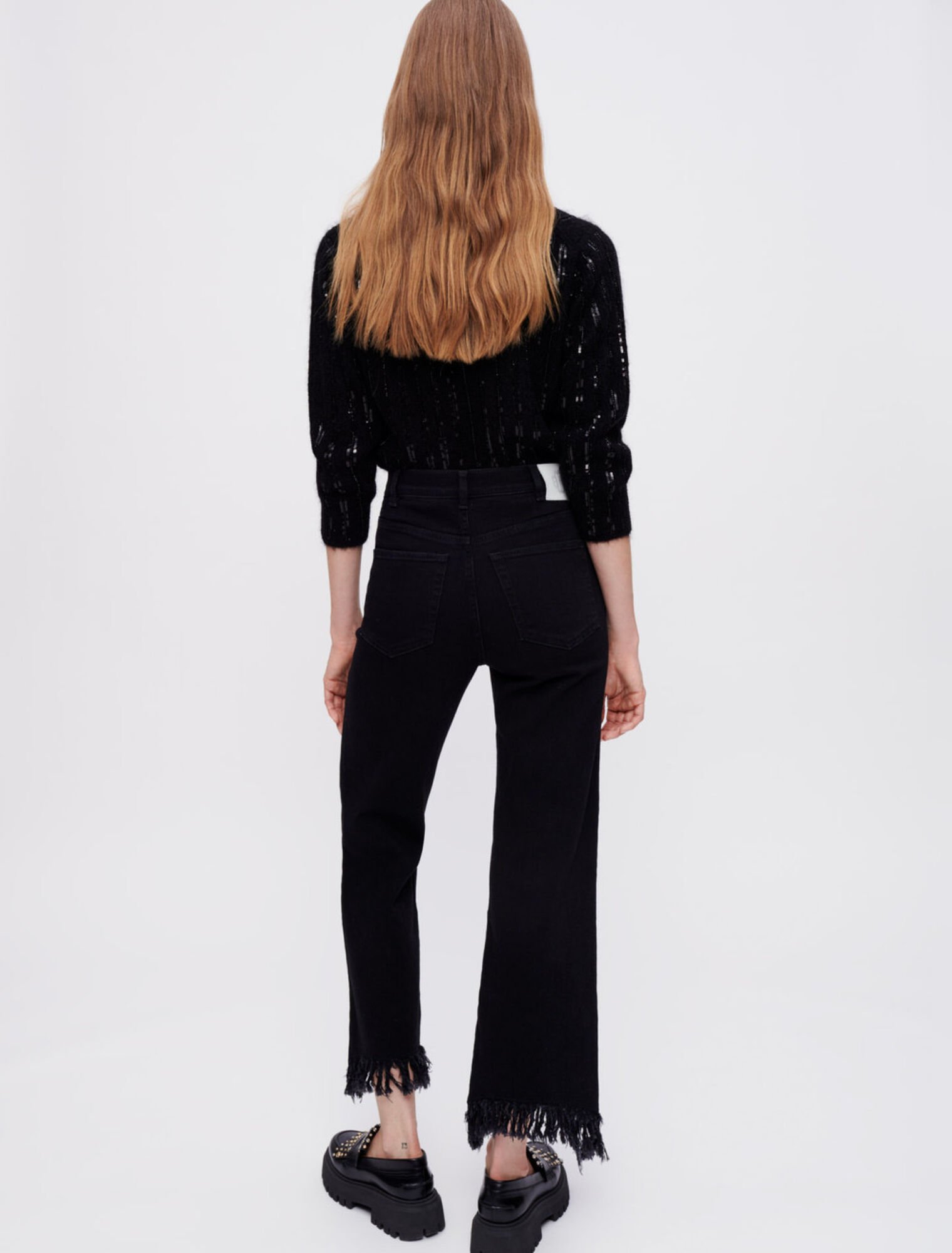 Jean noir taille haute déchiré en bas