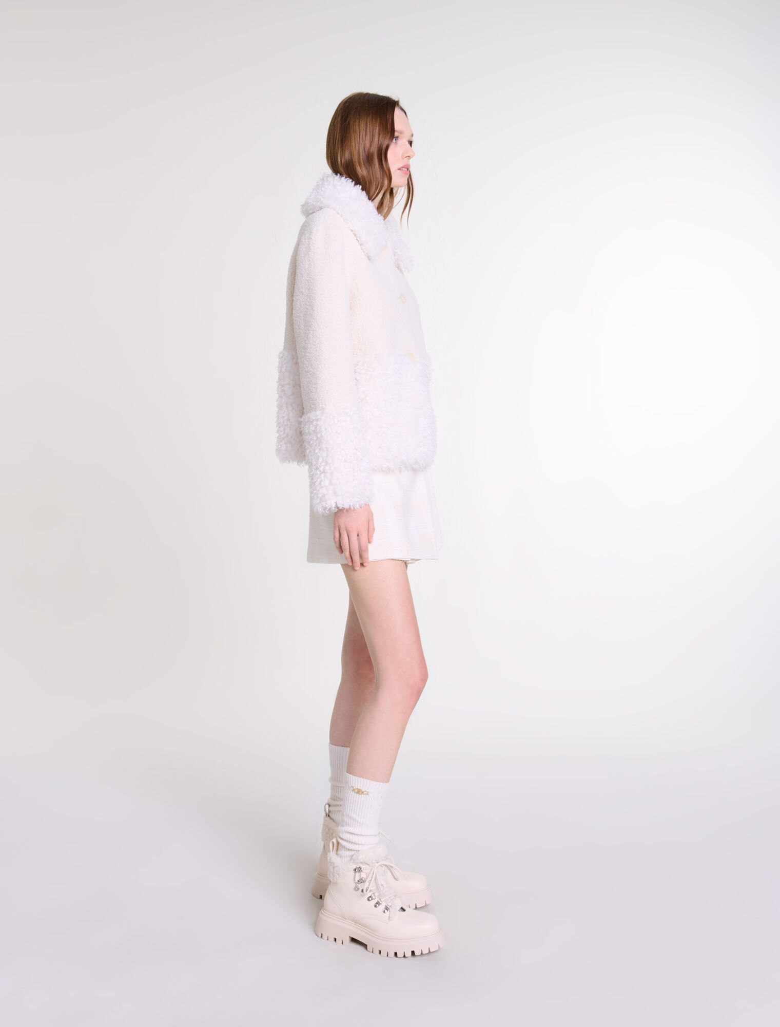 Manteau court fausse fourrure