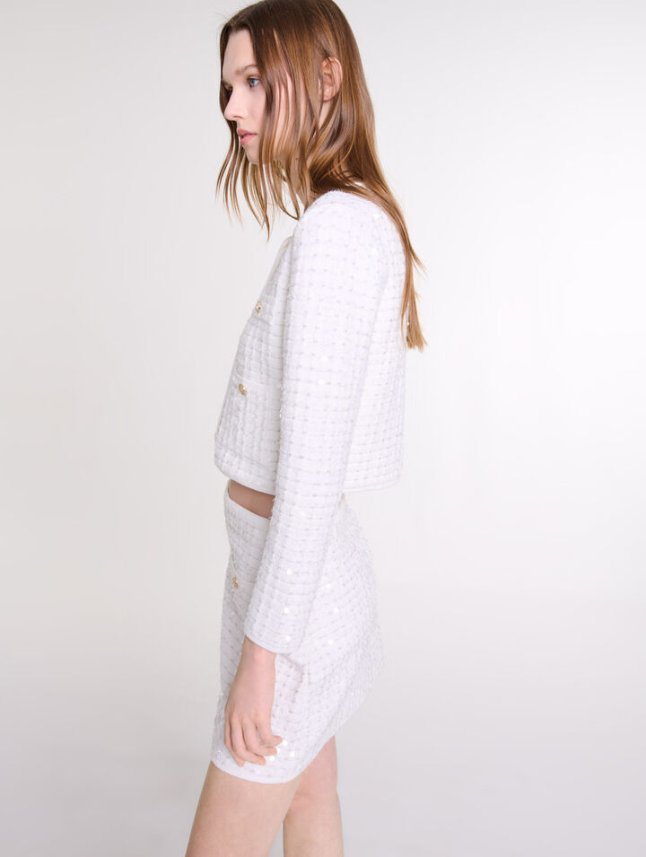 Jupe courte en maille à sequins