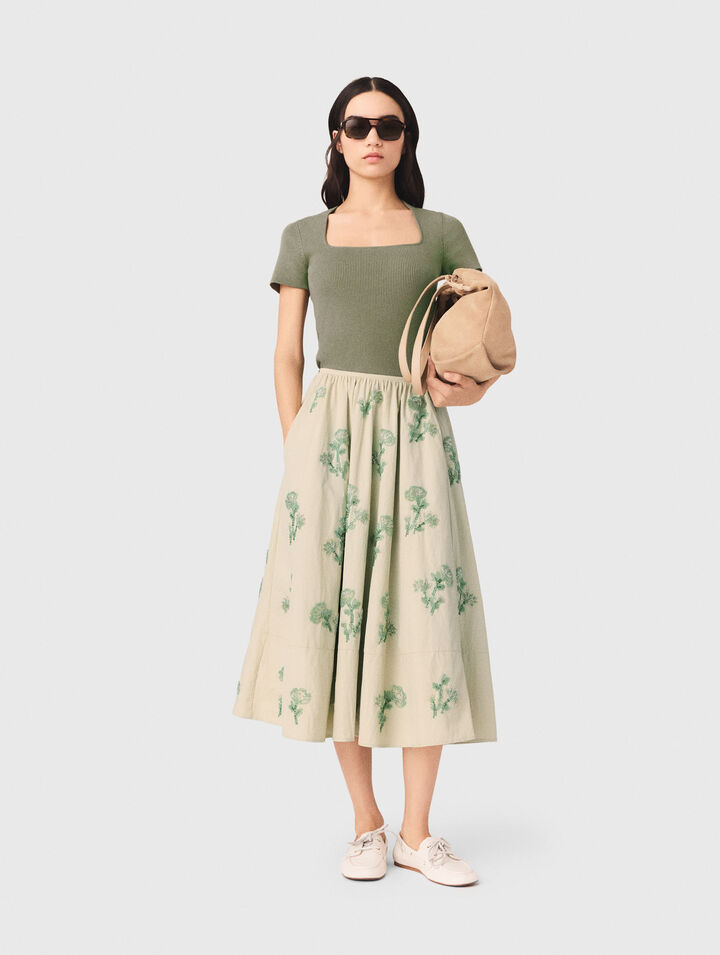 Jupe en mati&egrave;re technique brod&eacute;