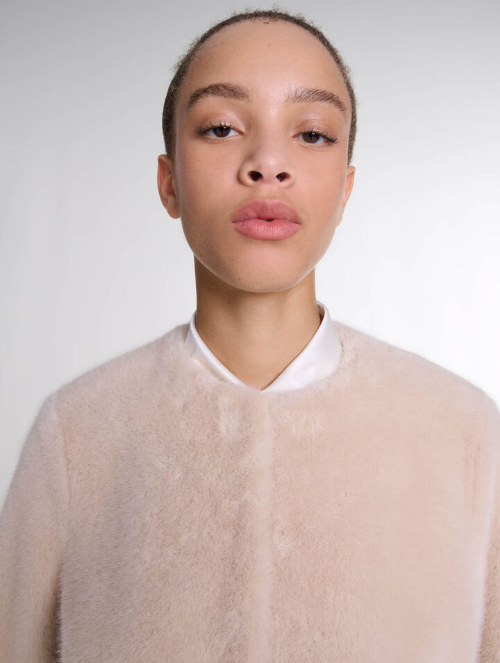 Veste courte en fausse fourrure