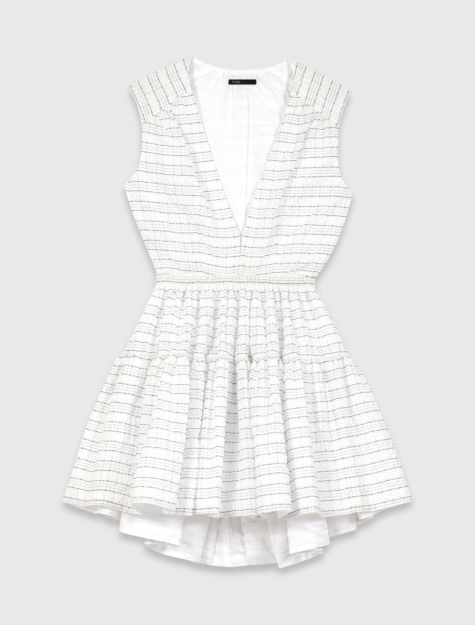 Robe courte &eacute;vas&eacute;e et dos ouvert