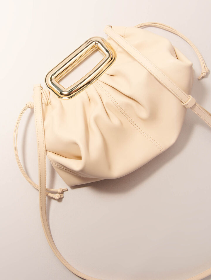 Clutch en cuir et poignée métal