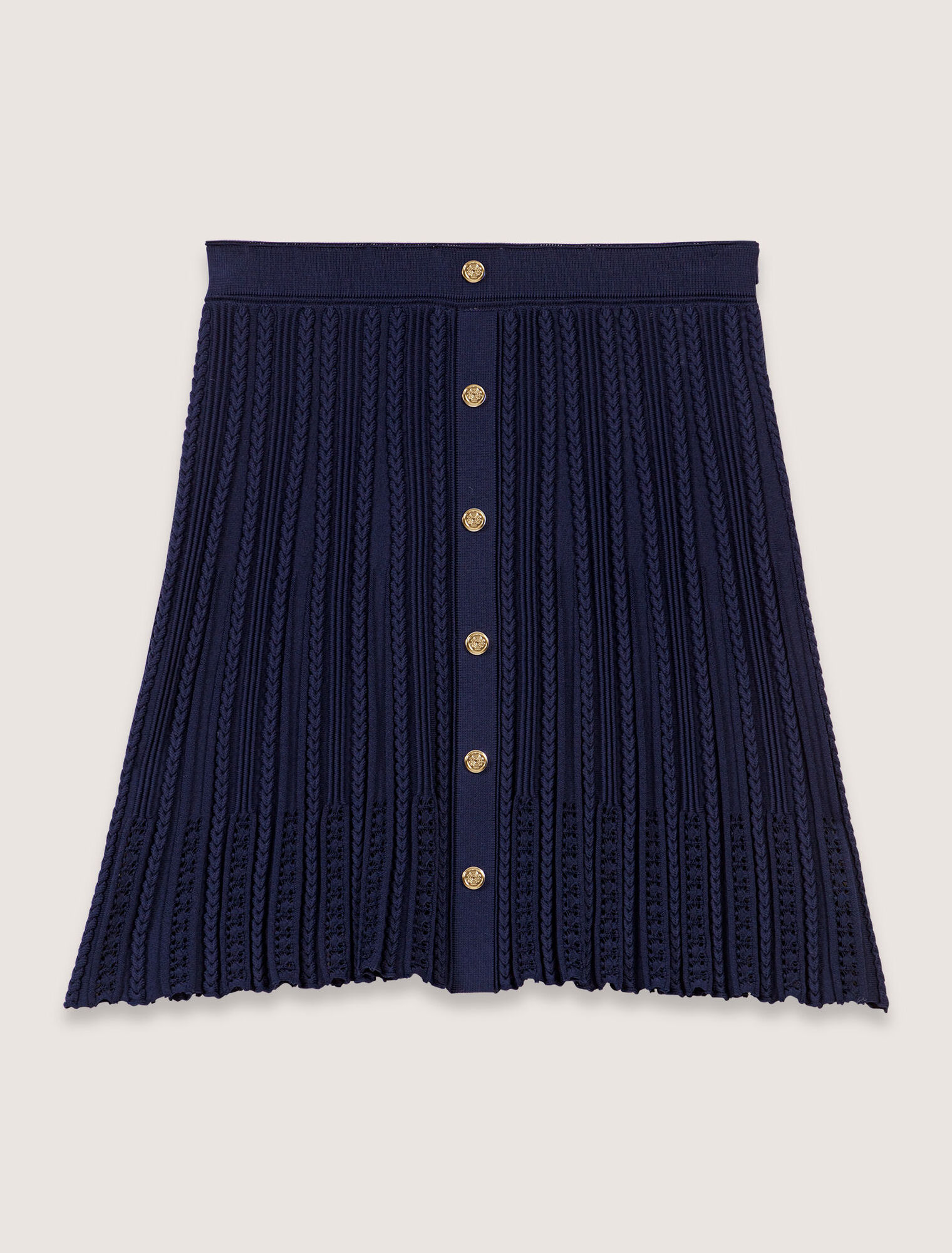 Jupe courte en maille tressée
