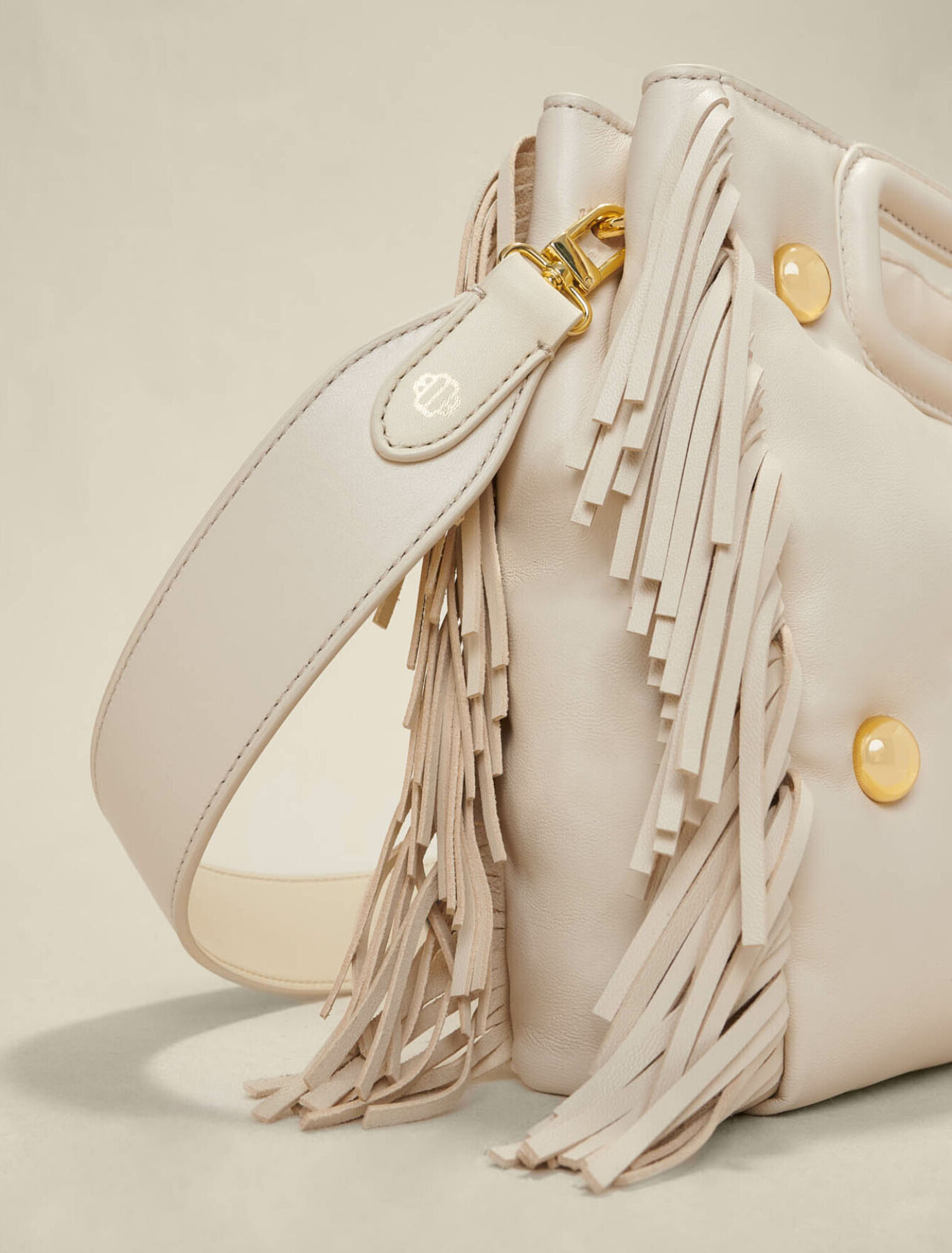 Sac M en cuir matelassé à studs