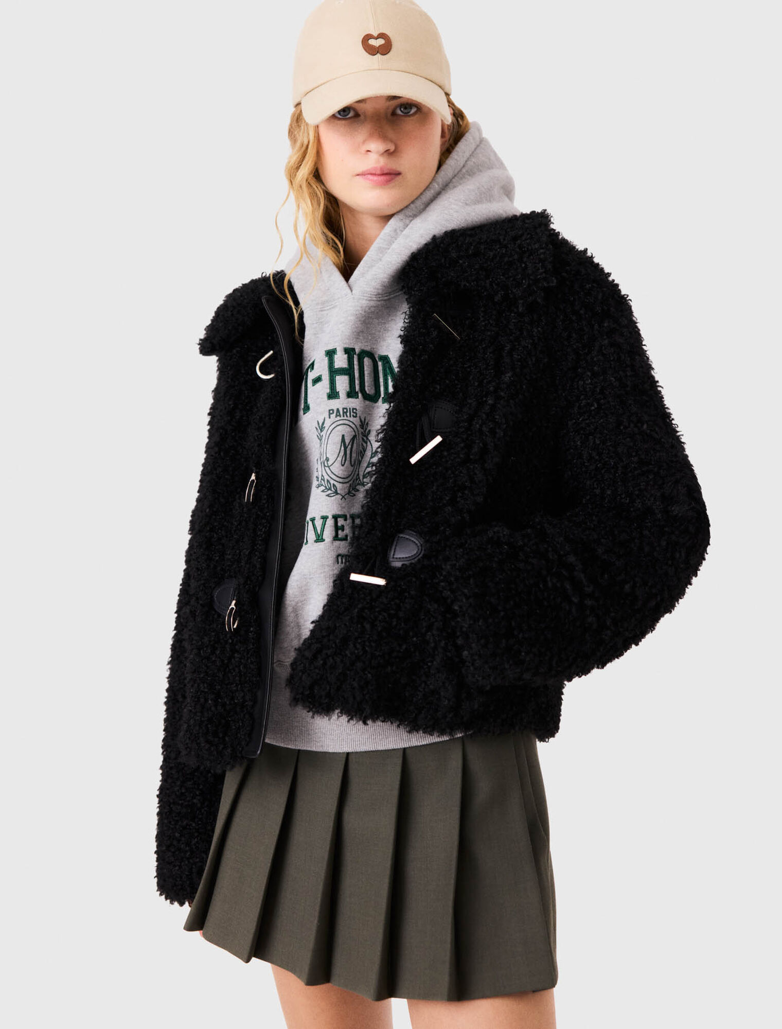 Blouson en fausse fourrure boucl&eacute;e