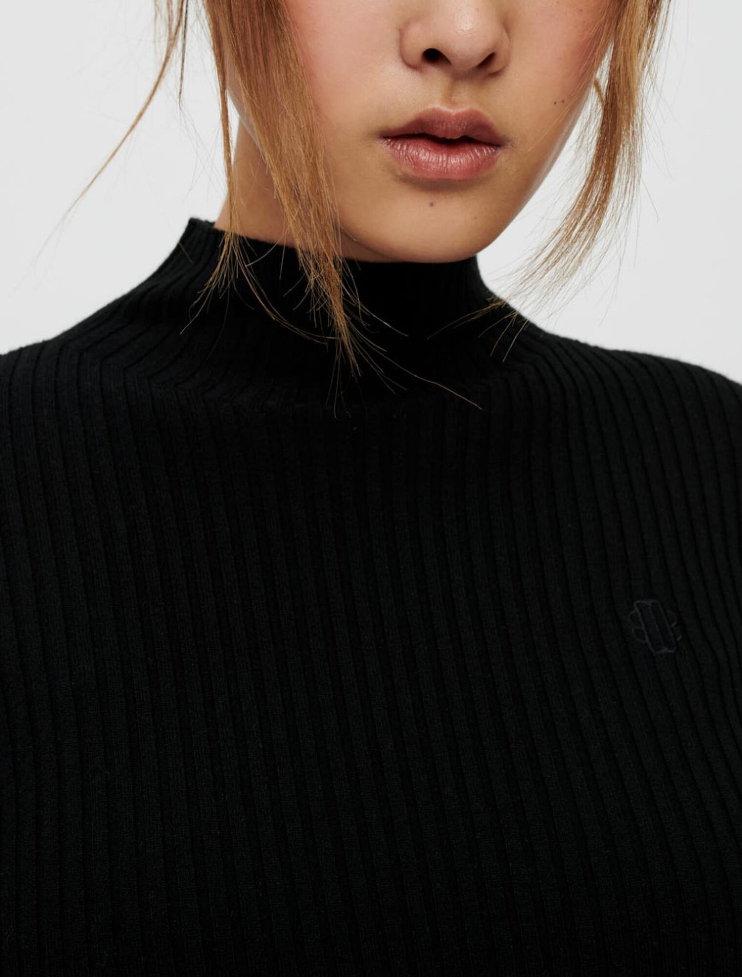 Pull près du corps ajouré aux manches