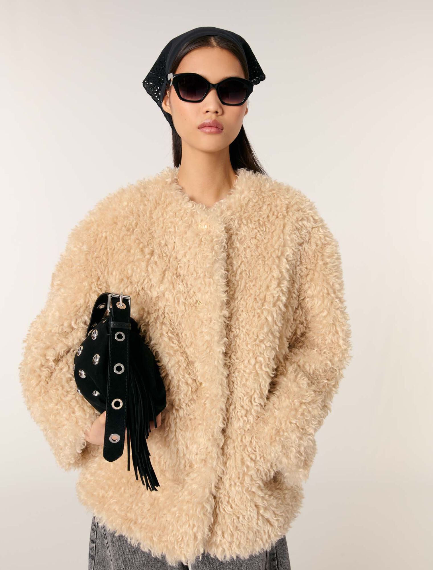 Manteau court en fausse fourrure