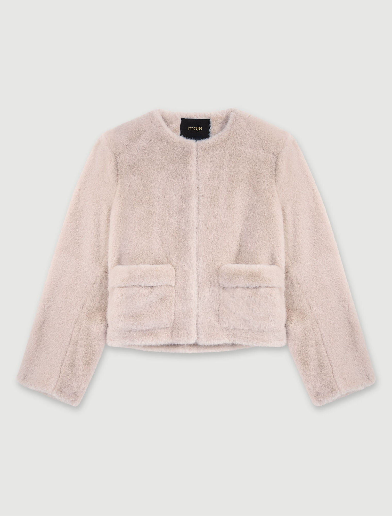 Veste courte en fausse fourrure