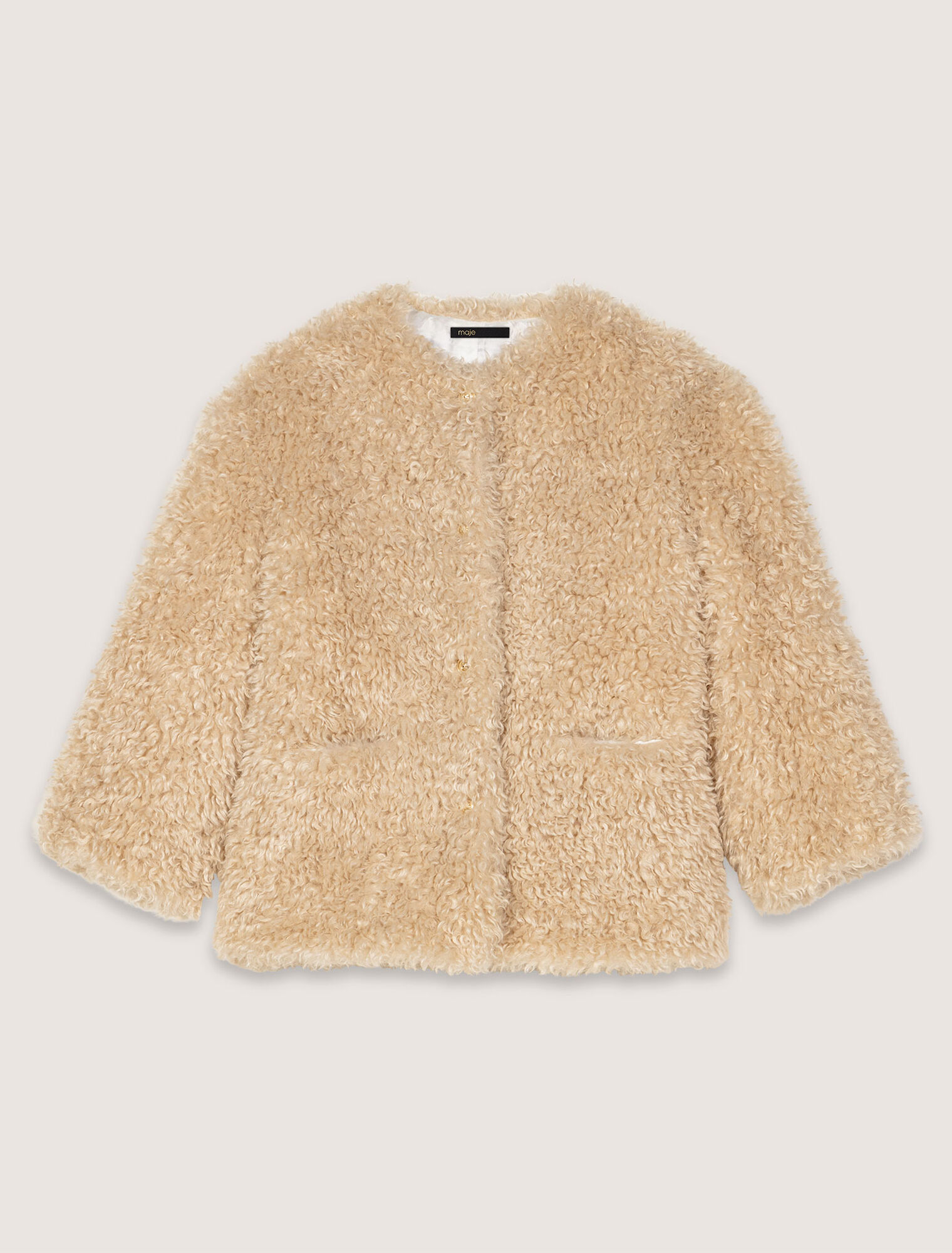 Manteau court en fausse fourrure