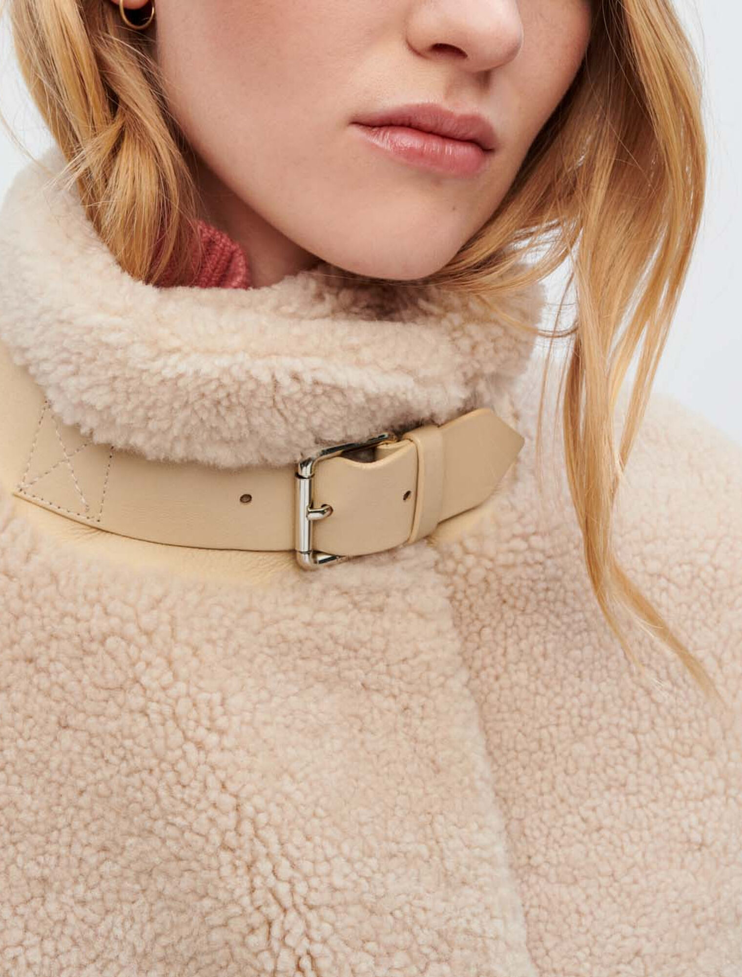 Manteau en peau lainée et cuir