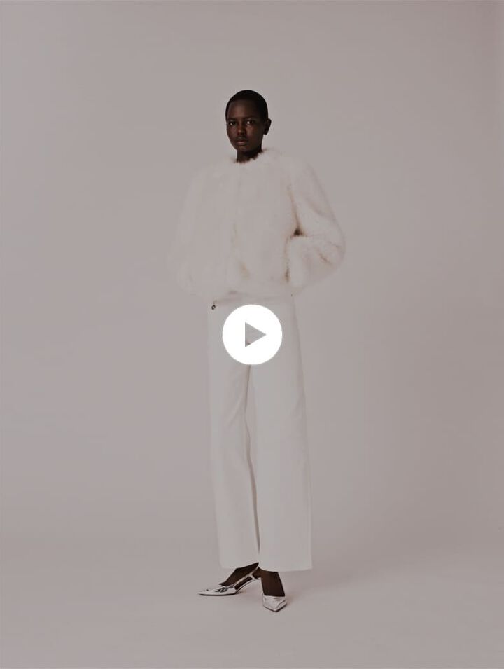 Blouson court en fausse fourrure