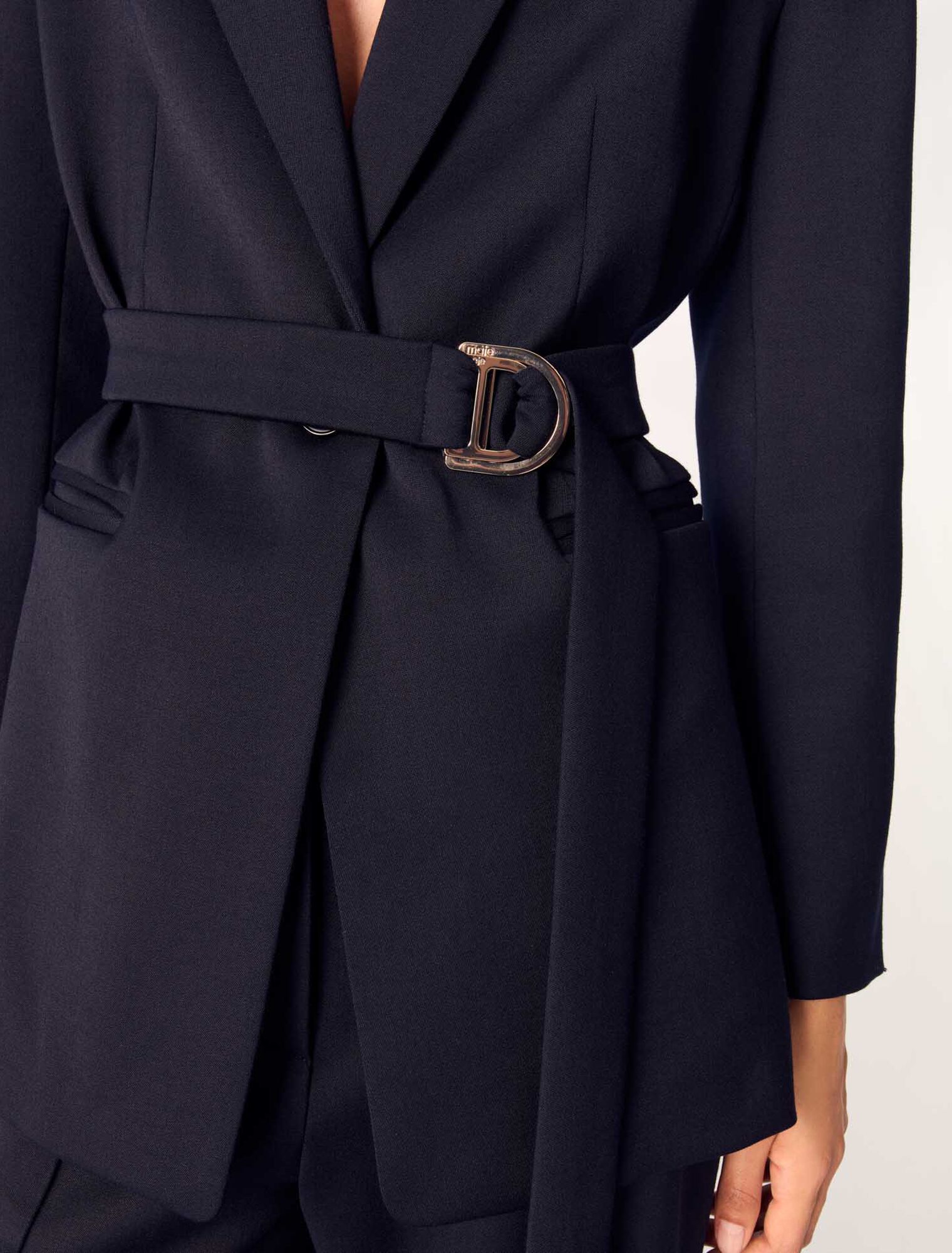 Veste tailleur avec dos plissé