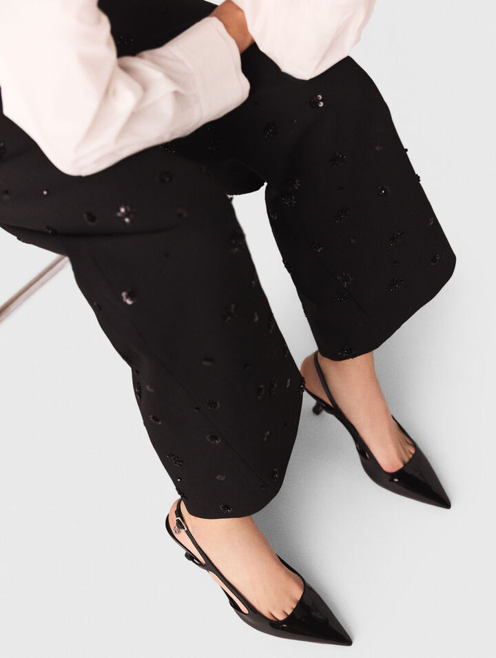 Pantalon à bretelles brodé