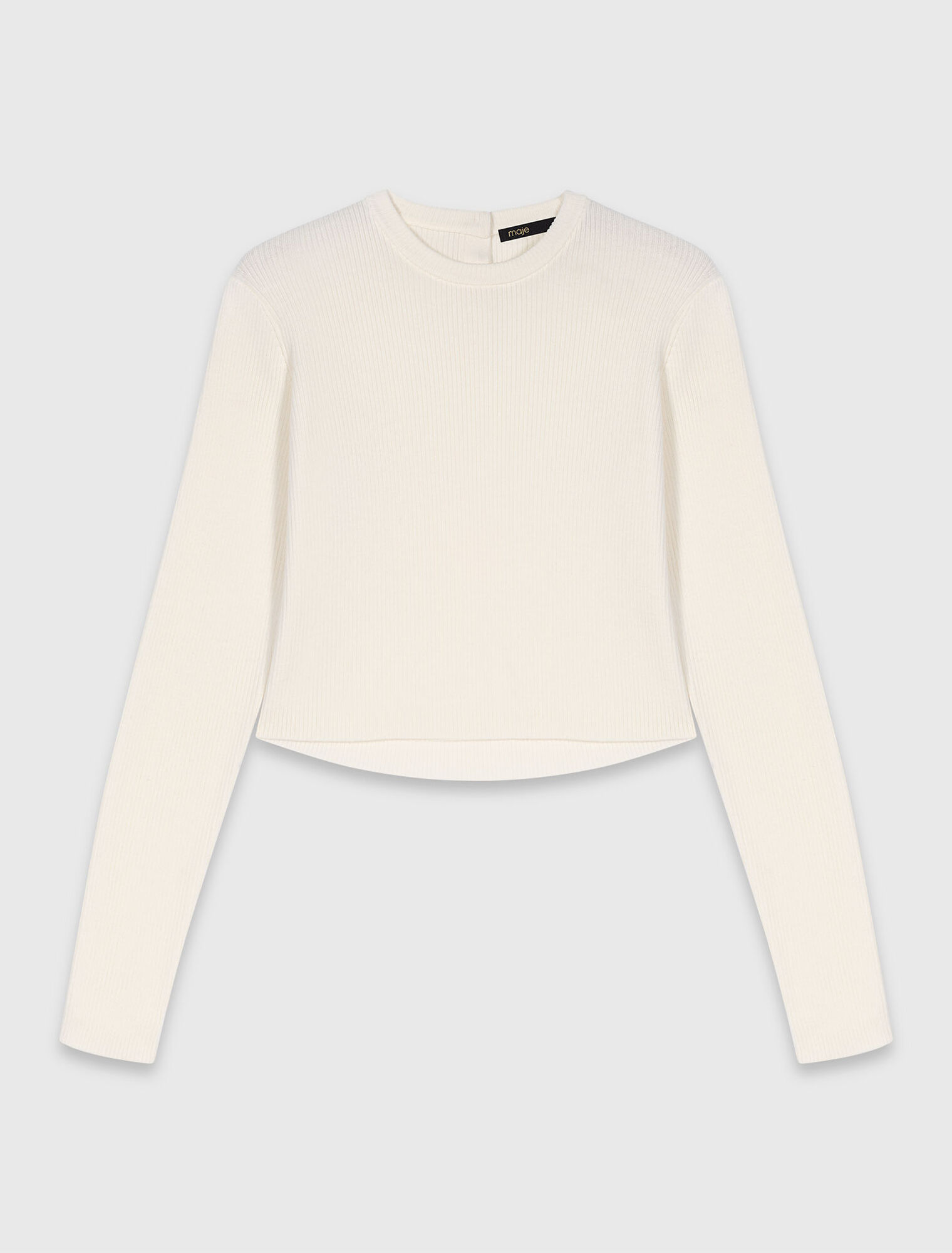 Pull avec boutons bijoux sur le dos