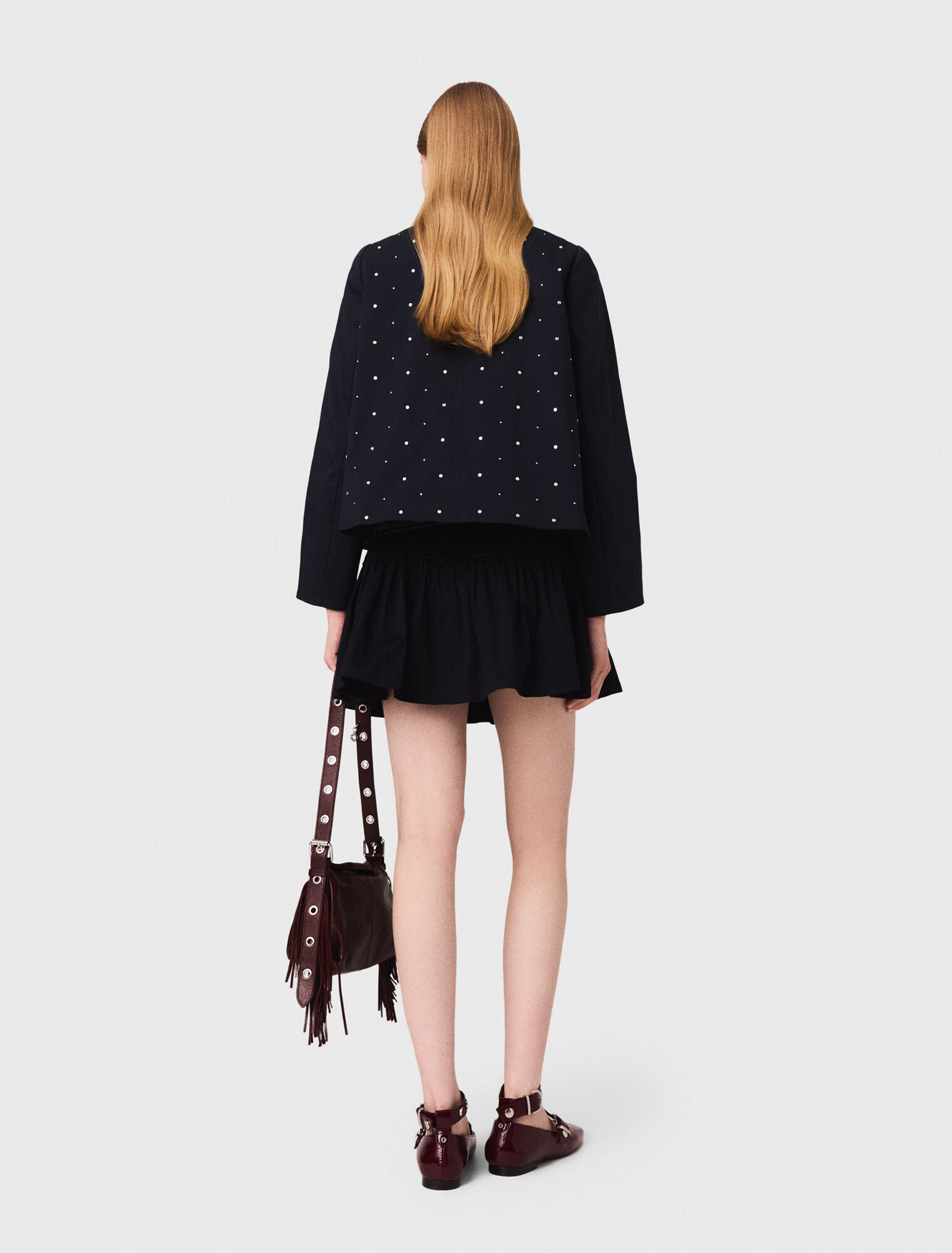 Veste courte col velours et clous