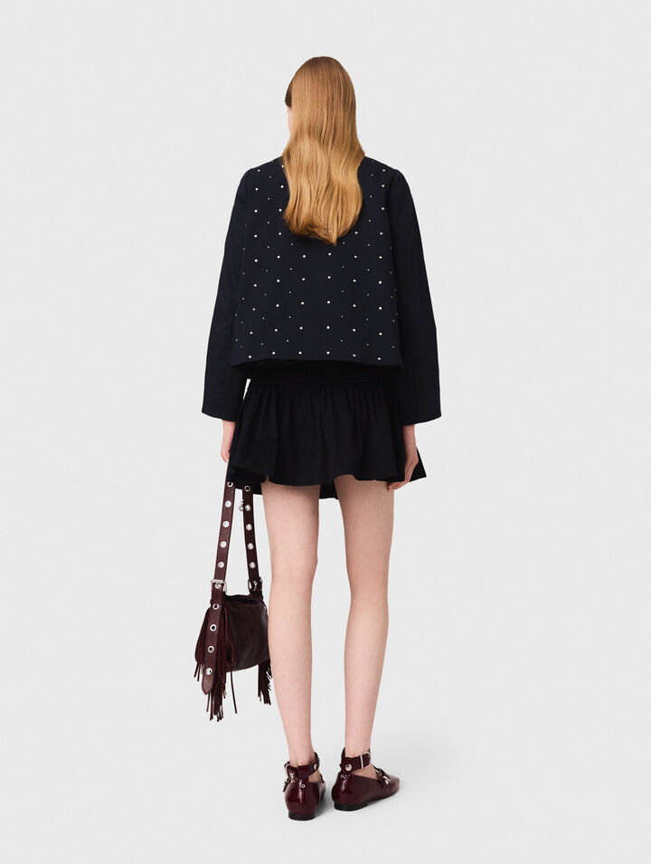 Veste courte col velours et clous