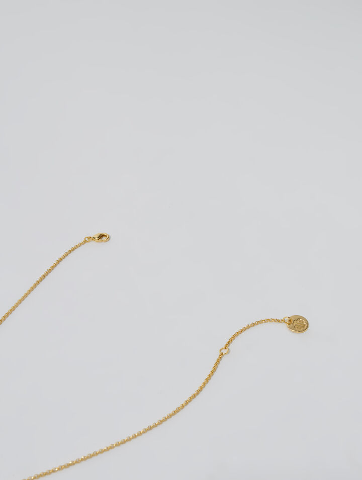 Collier doré orné de strass