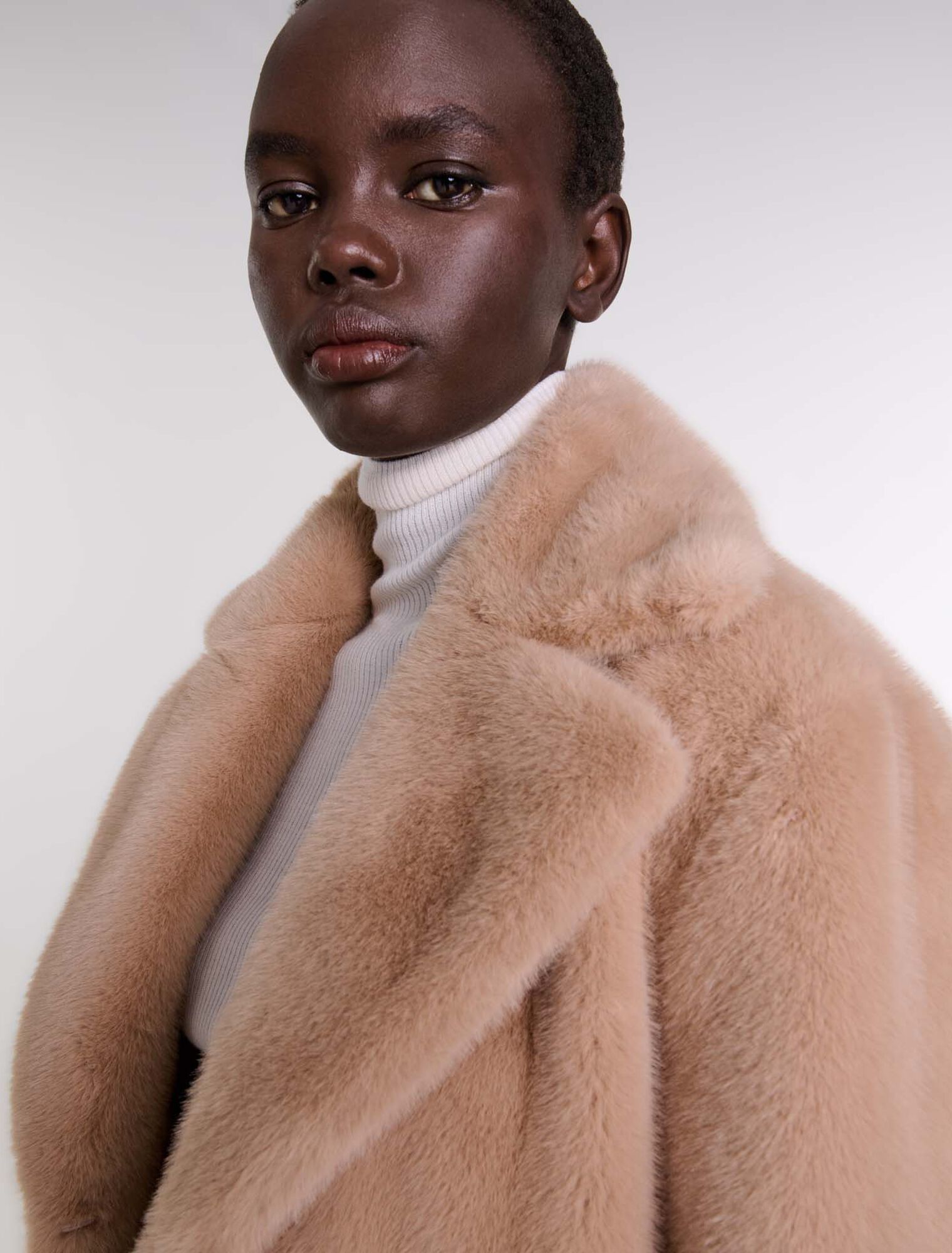 Manteau en fausse fourrure