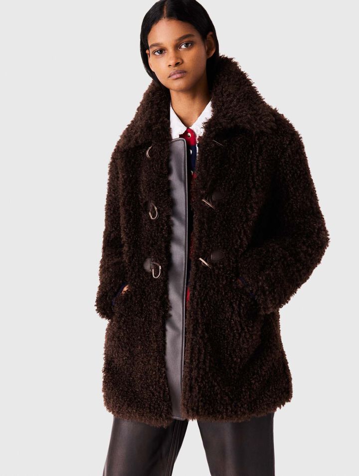 Manteau mi-long en fausse fourrure
