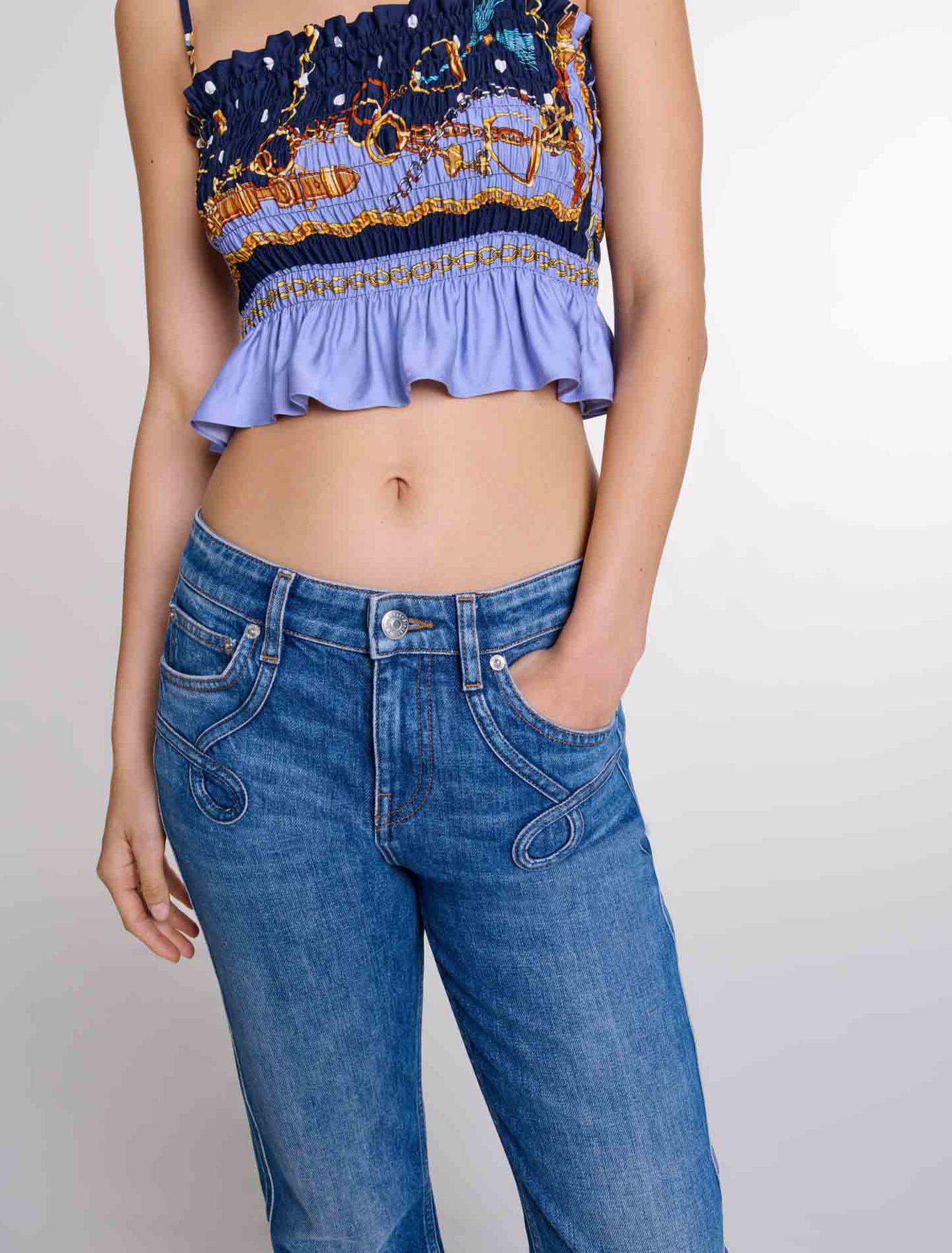 Jean flare à poches brodées