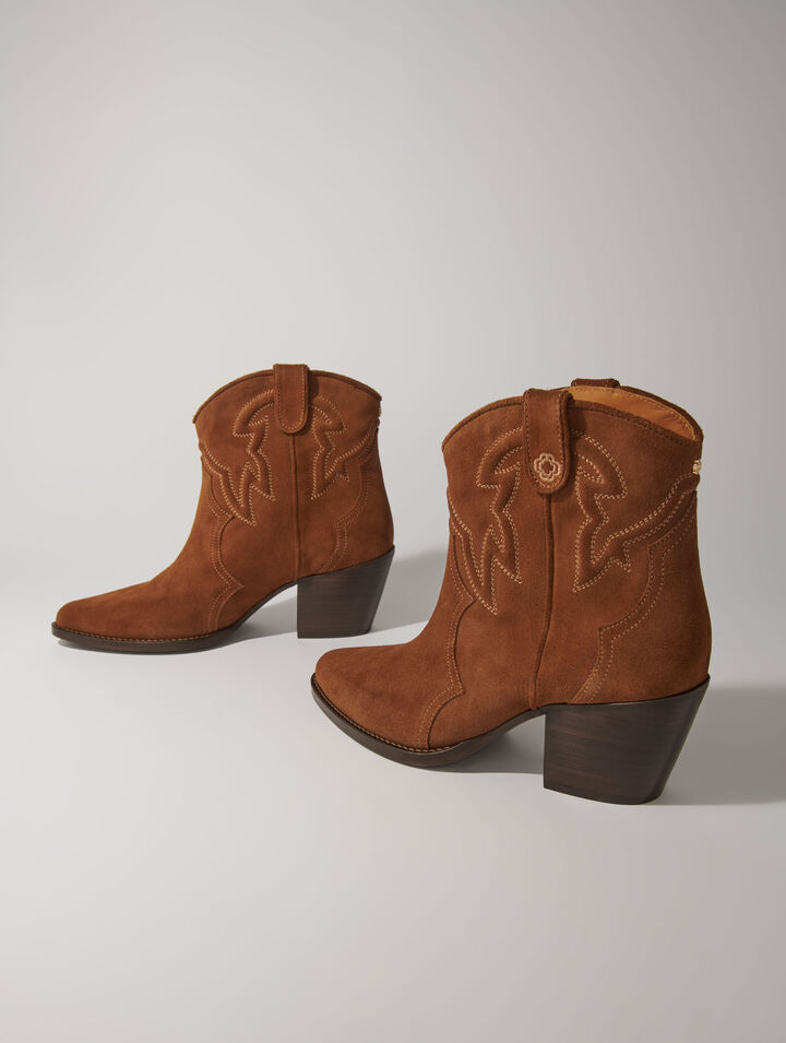 Bottines santiags en cuir suédé