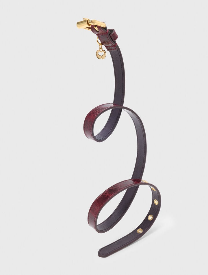 Ceinture fine en cuir &agrave; &oelig;illets