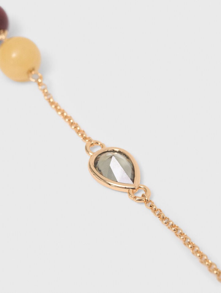 Bracelet &agrave; d&eacute;tails perles et strass