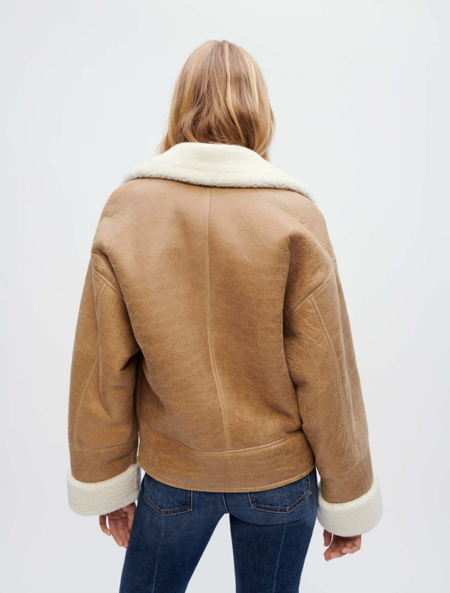 Manteau en peau lainée bicolore