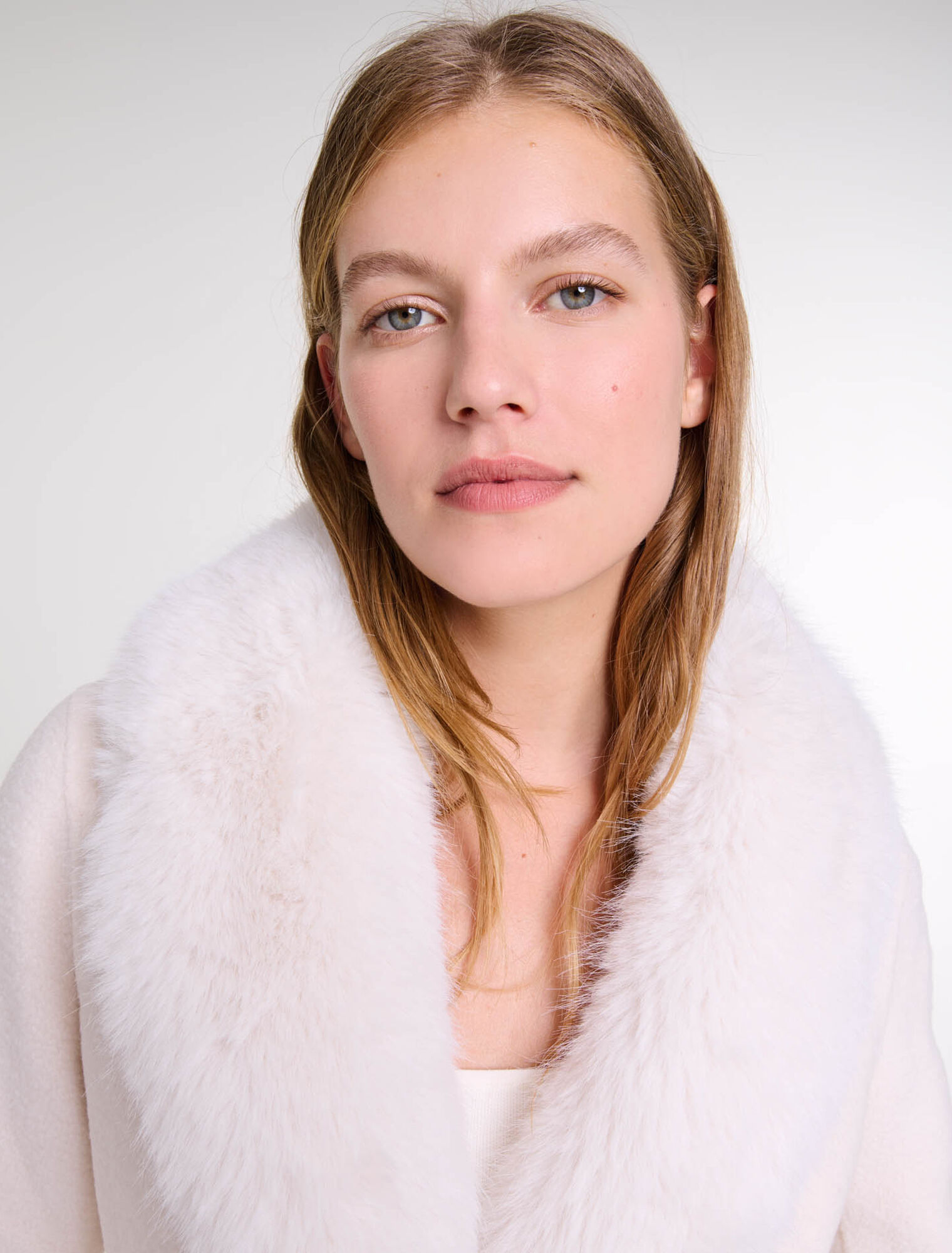 Manteau long en fausse fourrure