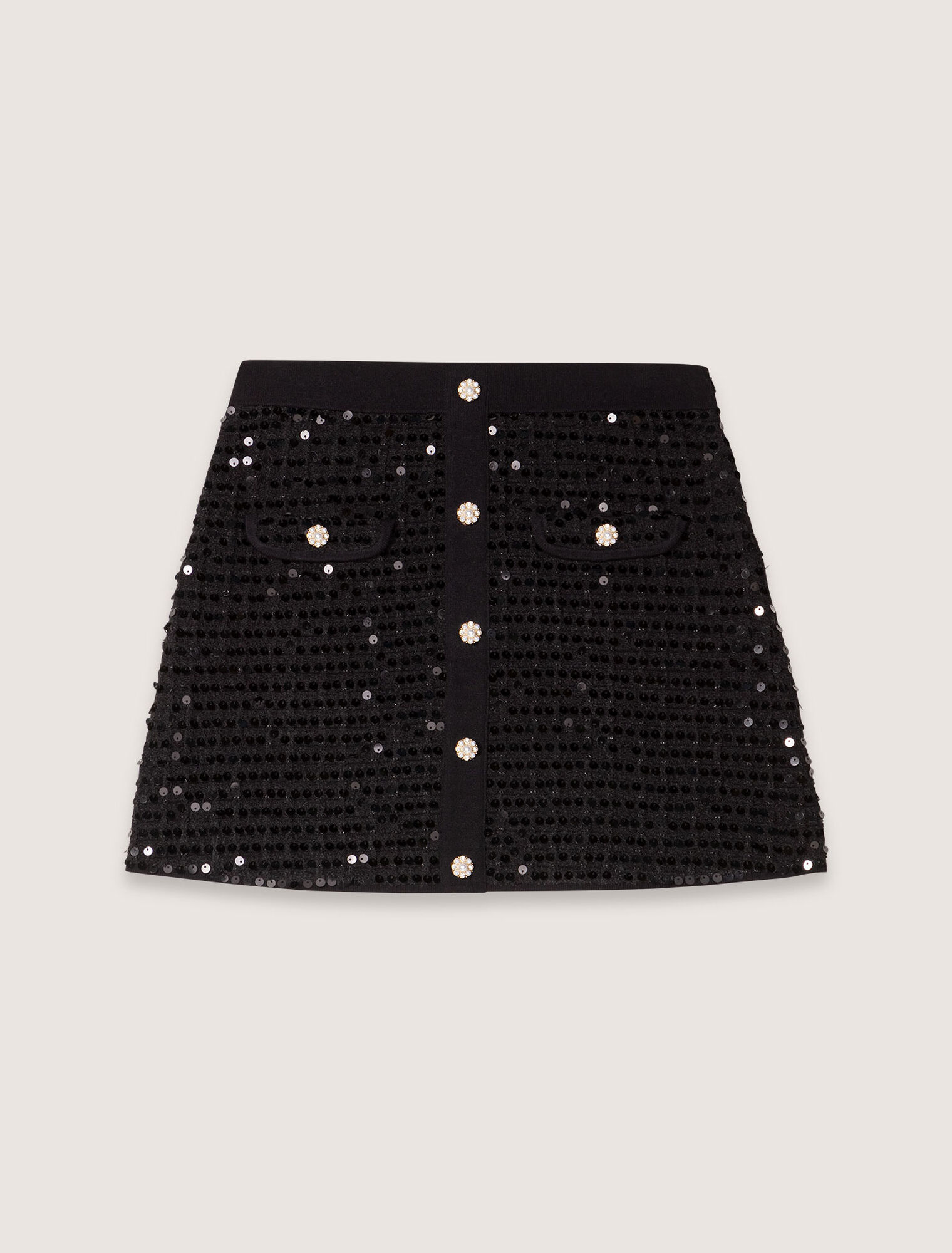 Jupe courte en maille à sequins