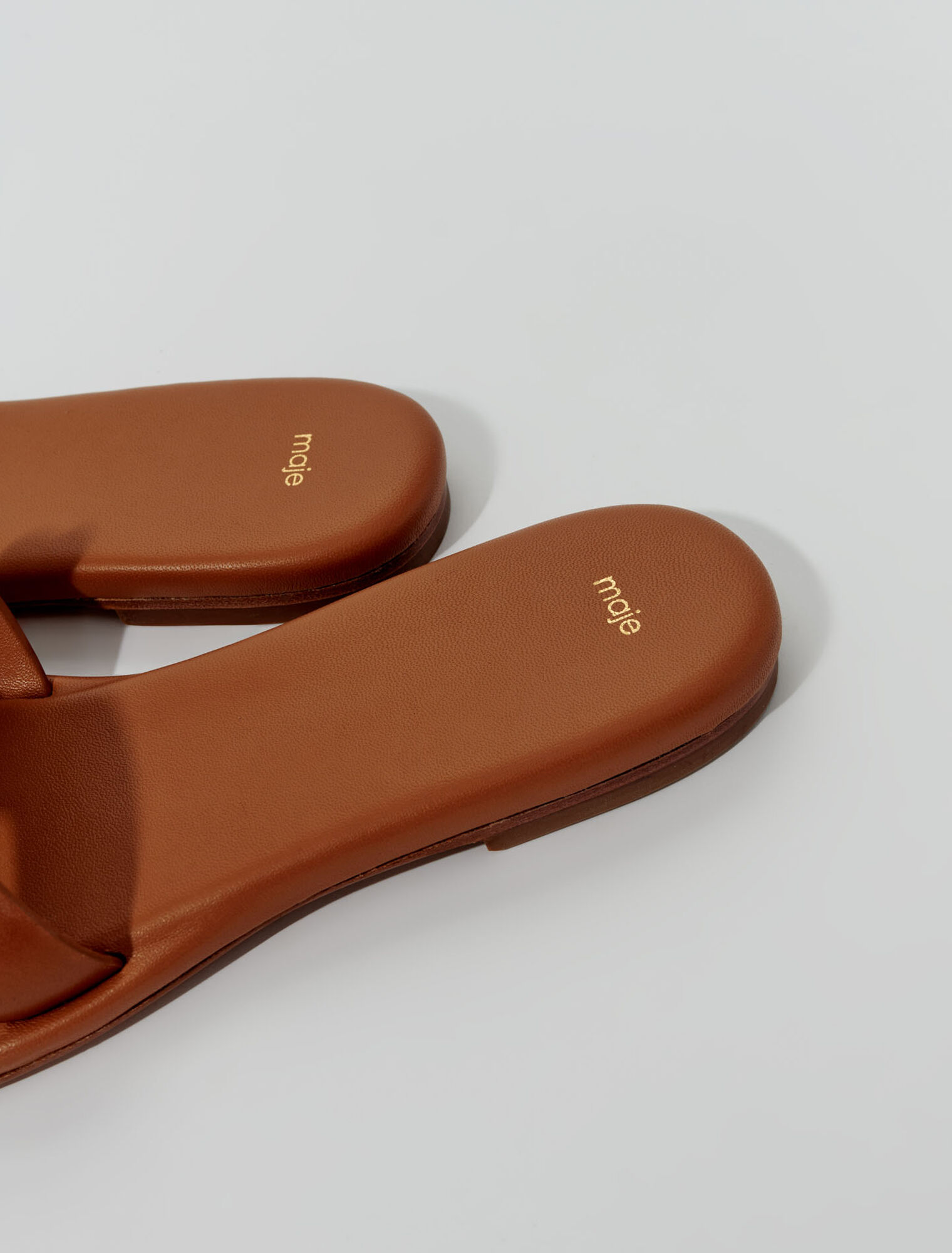 Mules en cuir ornées de studs