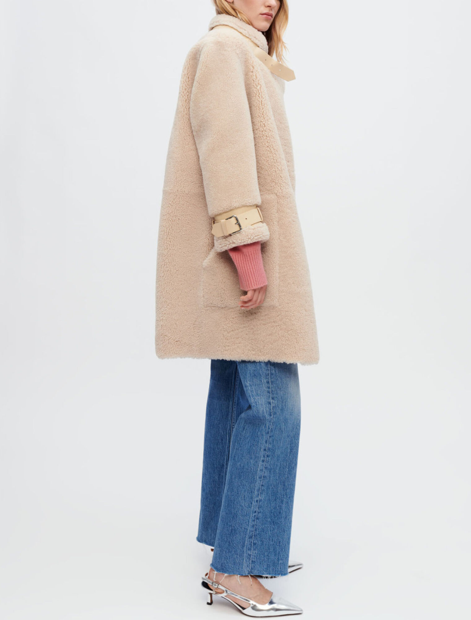 Manteau en peau lainée et cuir