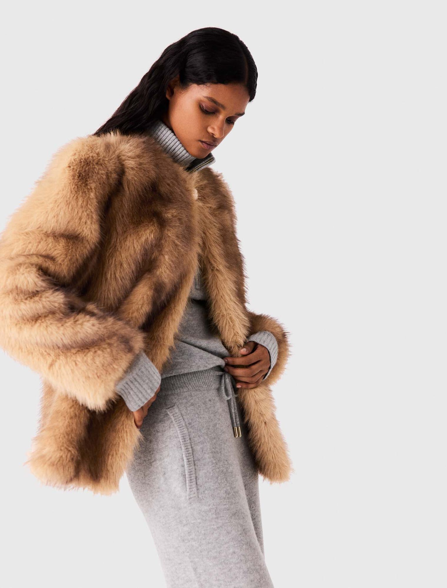 Manteau mi-long en fausse fourrure