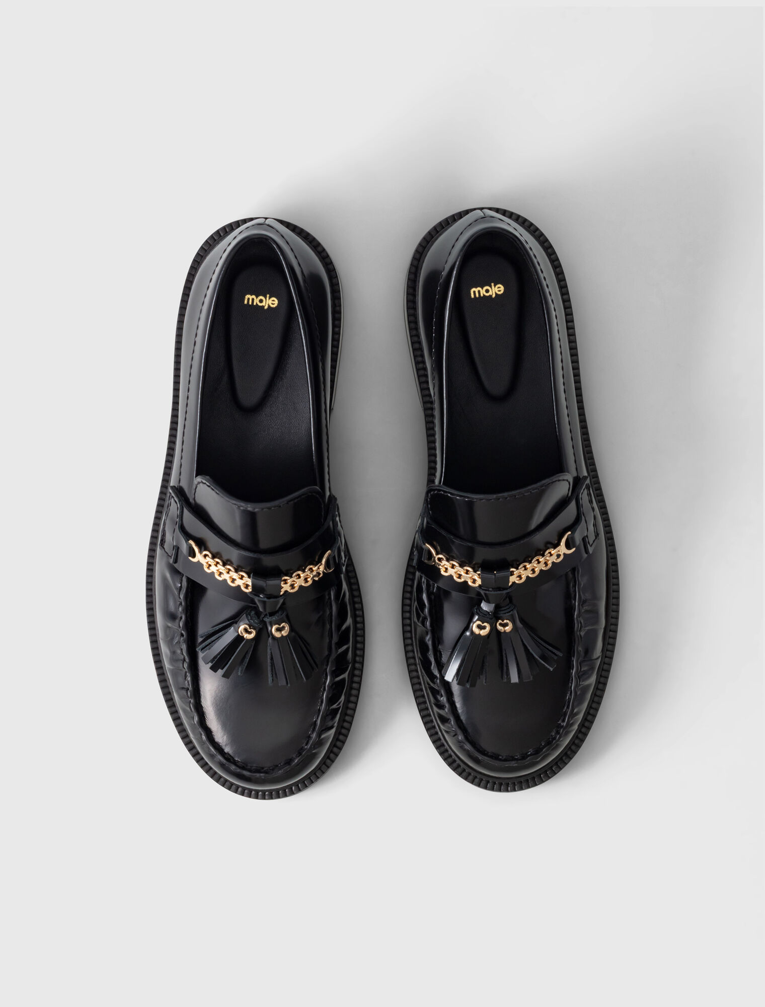 Mocassins en cuir &agrave; bords pliss&eacute;s