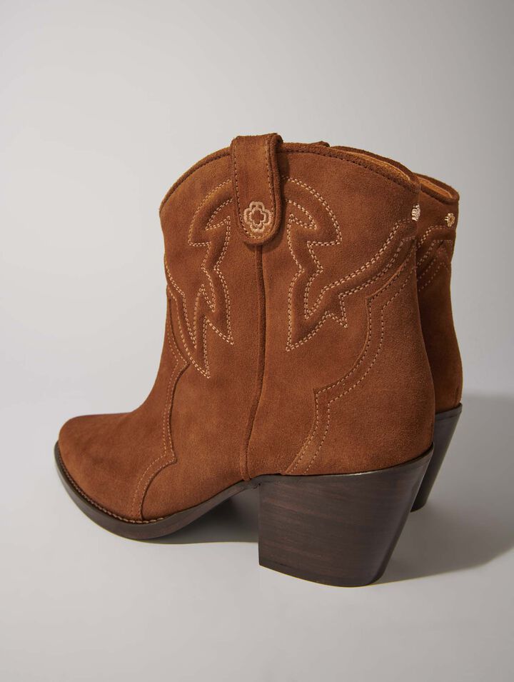 Bottines santiags en cuir suédé