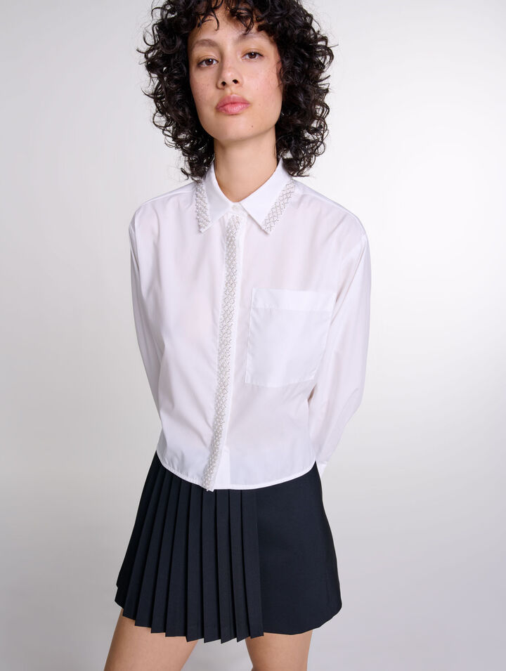 Chemise courte ornée de perles