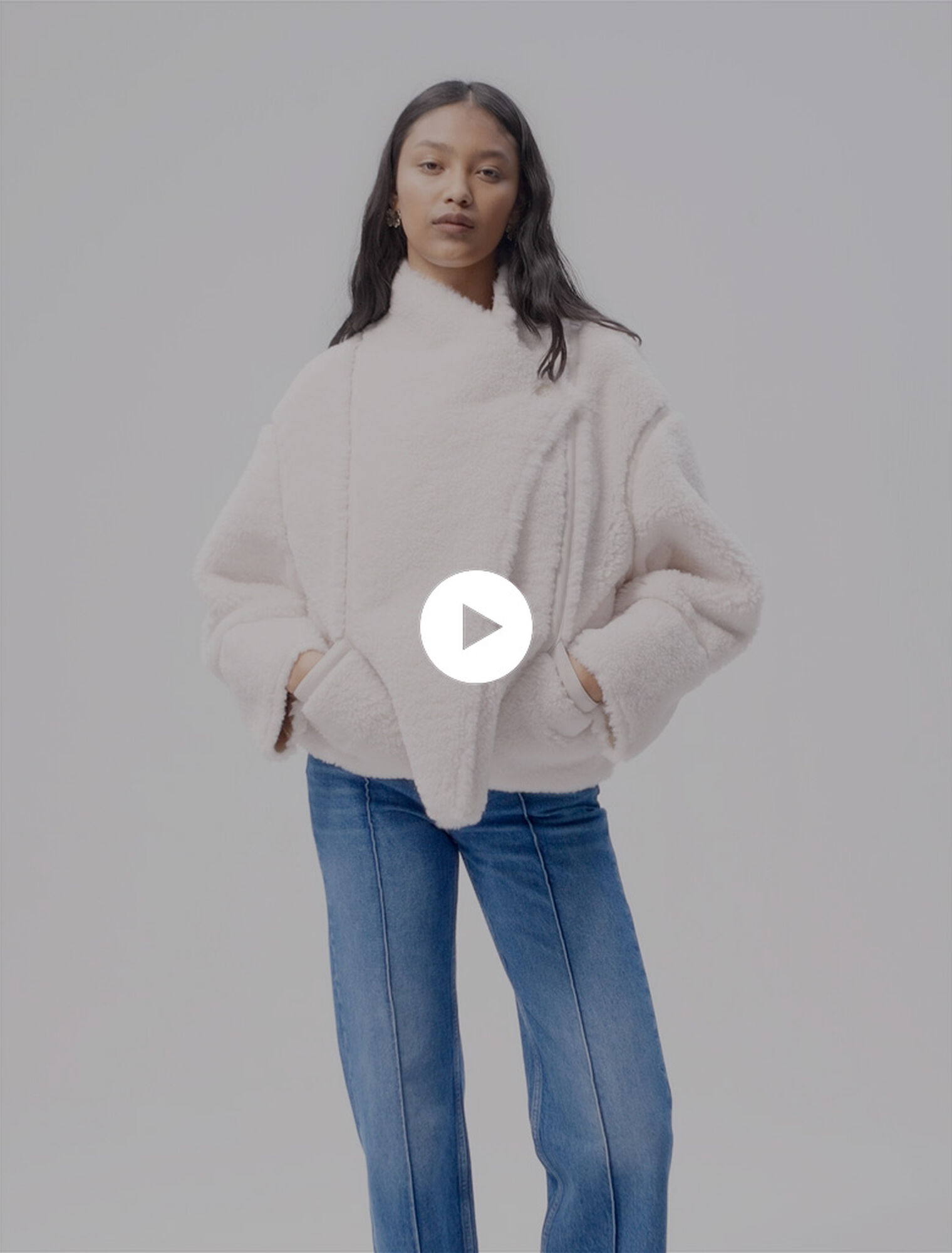 Manteau court en fausse fourrure